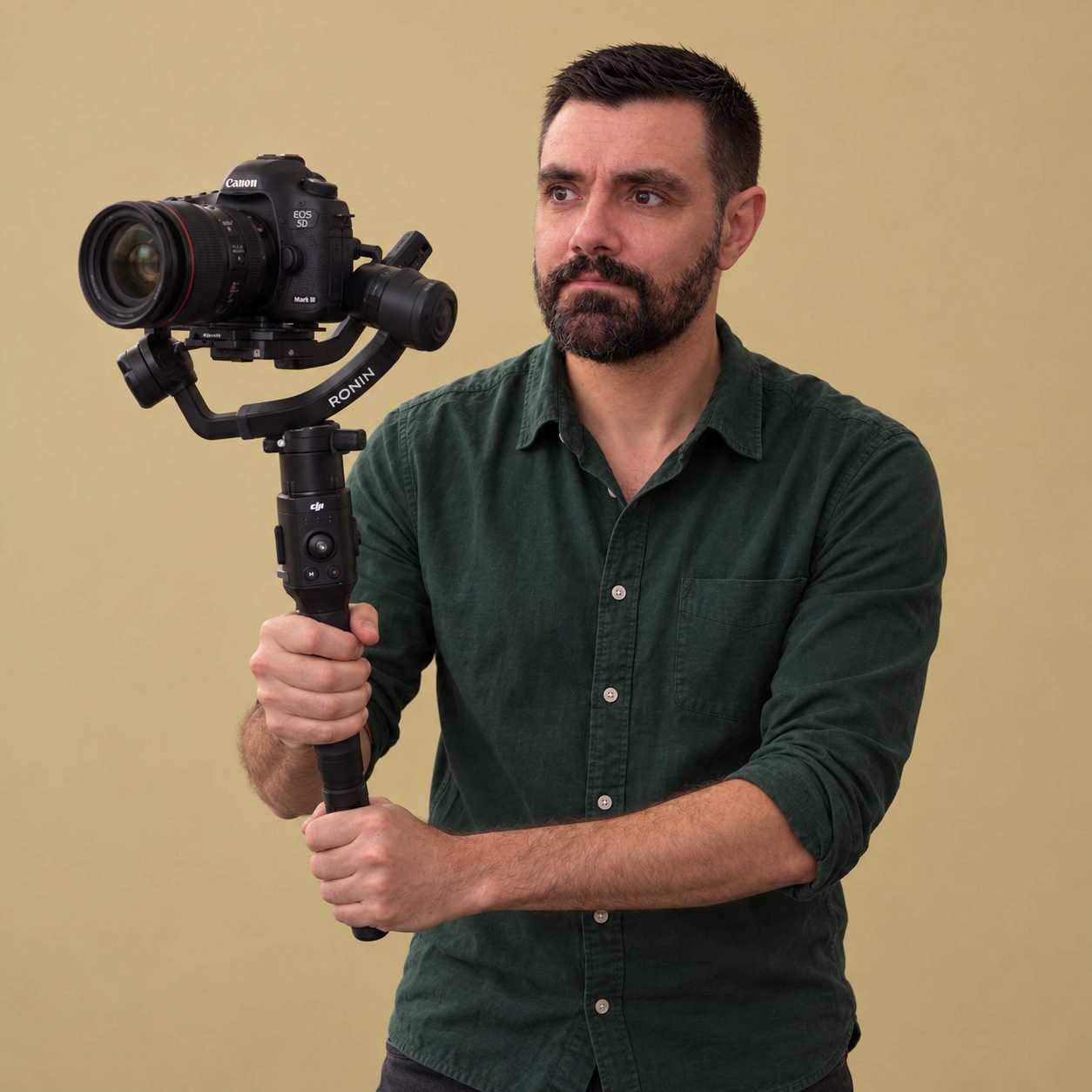 Oliver operating a camera on a gimbal, illustrative portrait
